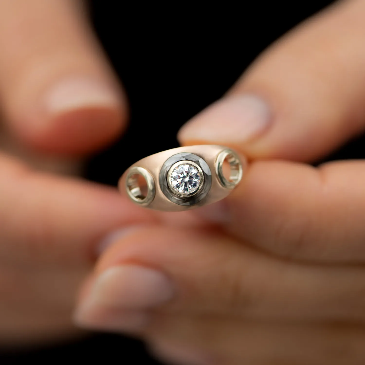 Piercing Engagement Ring with Grommets and a Grey Diamond Halo