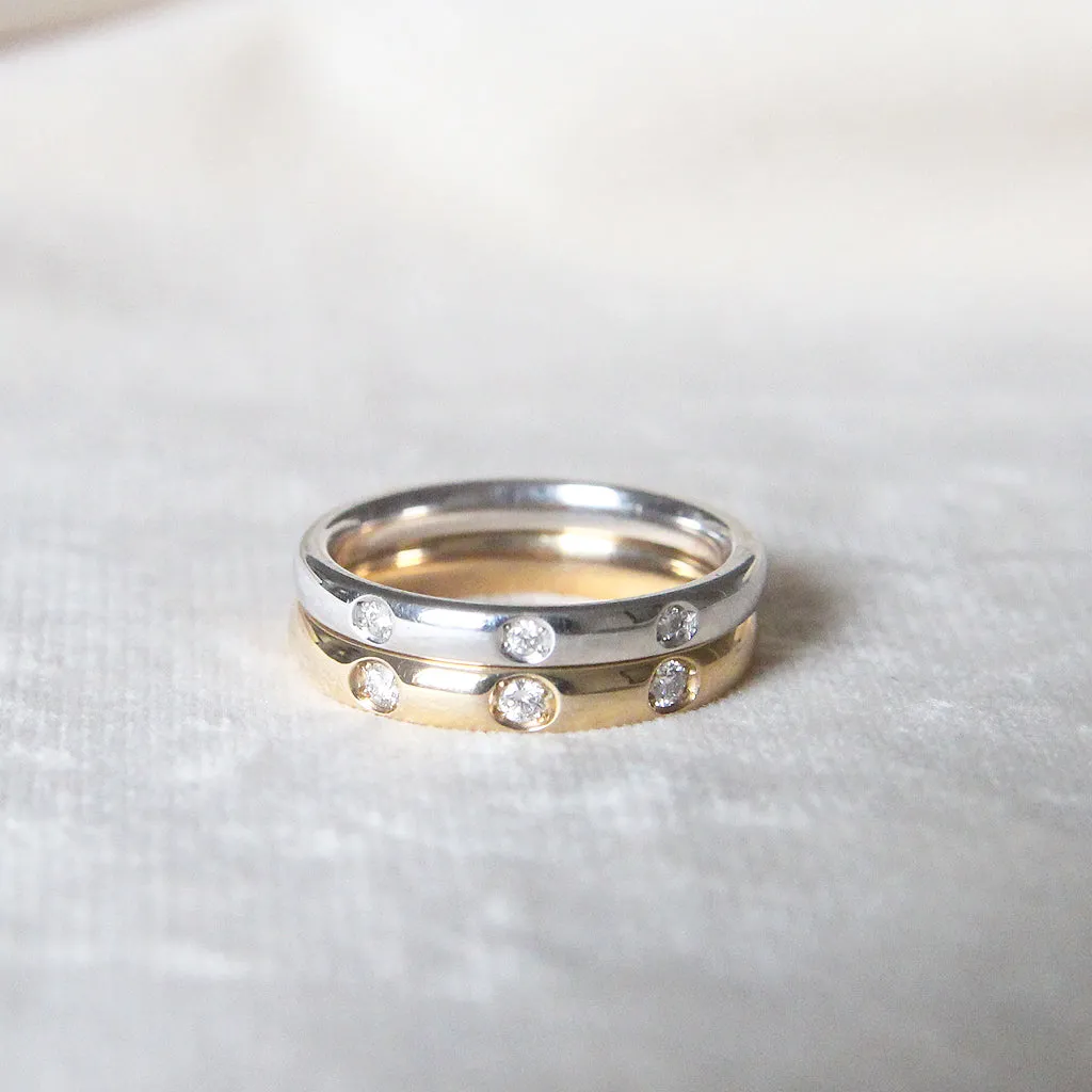 The Court Shape Wedding Band with Three Diamonds